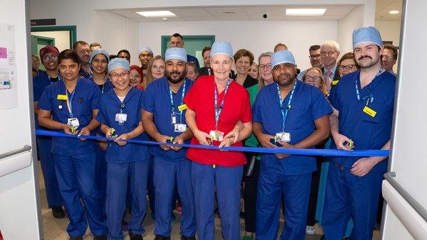 Theatre staff working in the new Daycase Surgical Unit cut the ribbon to declare the new facility open